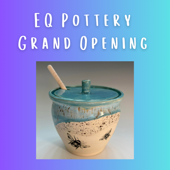 homemade ceramic honey pot with spoon sticking out